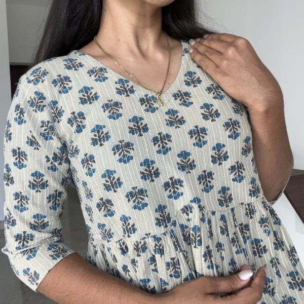 Elegant Beige Floral Printed Peplum Top – Chic Everyday Style